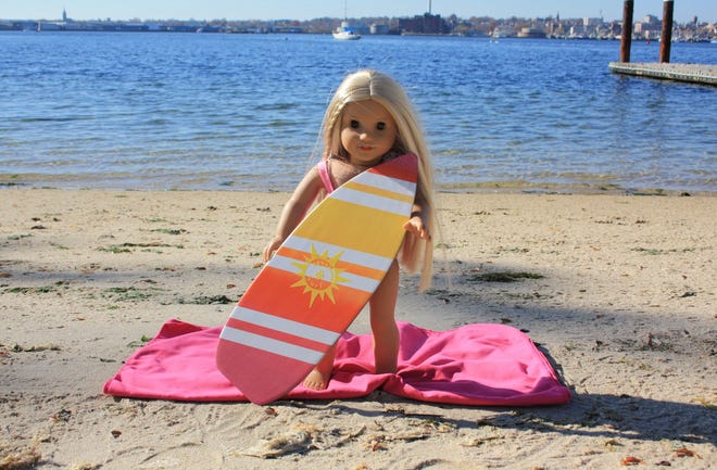 Fairhaven artist Kyra Yorkton and her father make and design doll surfboards at the Etsy shop.