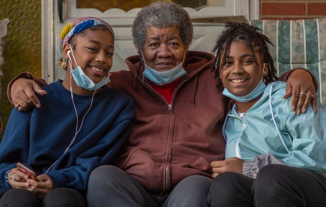 Linda Green. 71, of Lincoln Heights, lost Richard, her husband of 48 years, in July. She now is raising three of her granddaughters. Here she is with Takiya Roseman, 14, left, and Na'Kiyah Roseman 11. She needs some help fixing the gutters of her house and repairing some floors.