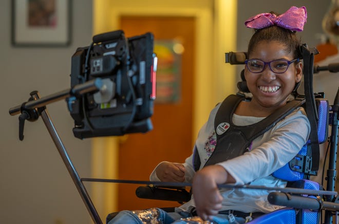 Mariyah Maddox has a welcome smile for guests in her Green Township home. Mariyah, 11, has over 30 diagnosed medical conditions. Her Mother Brandi Maddox is her full-time caregiver.   They would like a specially constructed bicycle that would allow Mariyah to interact with other children in play, as well as improve her strength and coordination.