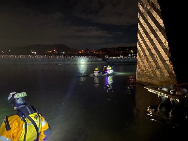 A Midland man was identified as the victim of the fatal Nov. 22 barge accident near the Montgomery Locks and Dam. Pictured are water search team members looking along the Ohio River for the man.