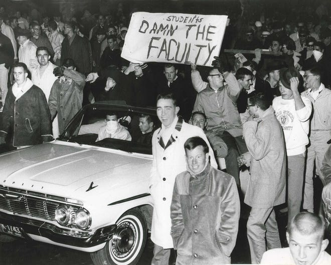 Ohio State students protest a vote by the university's faculty council in late November 1961 to turn down an invitation to play in the Rose Bowl.