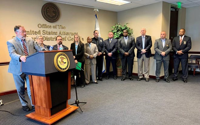 David H. Estes, Acting U.S. Attorney for the Southern District of Georgia, speaks during a news conference Nov. 22, 2021, to announce indictments in USA v. Patricio et al, Operation Blooming Onion, a human trafficking investigation naming 24 defendants on felony charges including human smuggling and document fraud.
