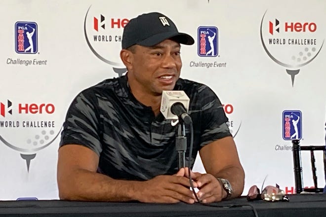 Tiger Woods holds his first press conference since his Feb. 23 car crash in Los Angeles at the Hero World Challenge golf tournament in Nassau, Bahamas, Tuesday, Nov. 30, 2021. (AP Photo/Doug Ferguson)