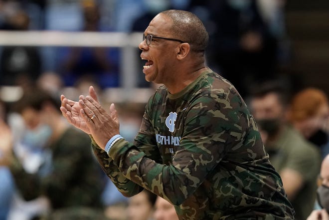 North Carolina head coach Hubert Davis reacts during the first half of an NCAA college basketball game in Chapel Hill, N.C., Friday, Nov. 12, 2021.