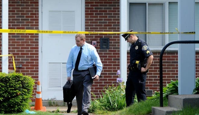 Cops working the scene where Galloway allegedly killed the woman