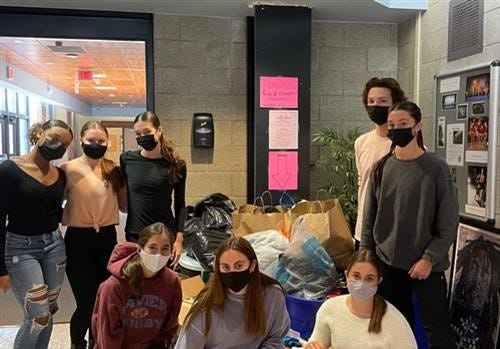 SCVTHS National Honor Society for Dance Arts students pose with some of their collected donations for their United Breast Cancer Foundation drive.