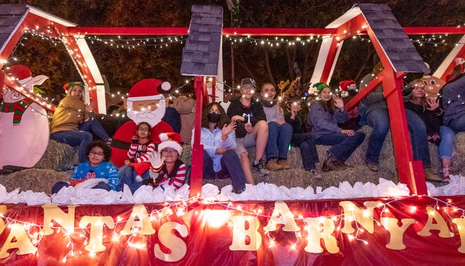 VTEC, pictured, and Family Healthcare Network won "Best Theme" for their entries in the Annual Candy Cane Lane Parade in Downtown Visalia on Monday, November 29, 2021.