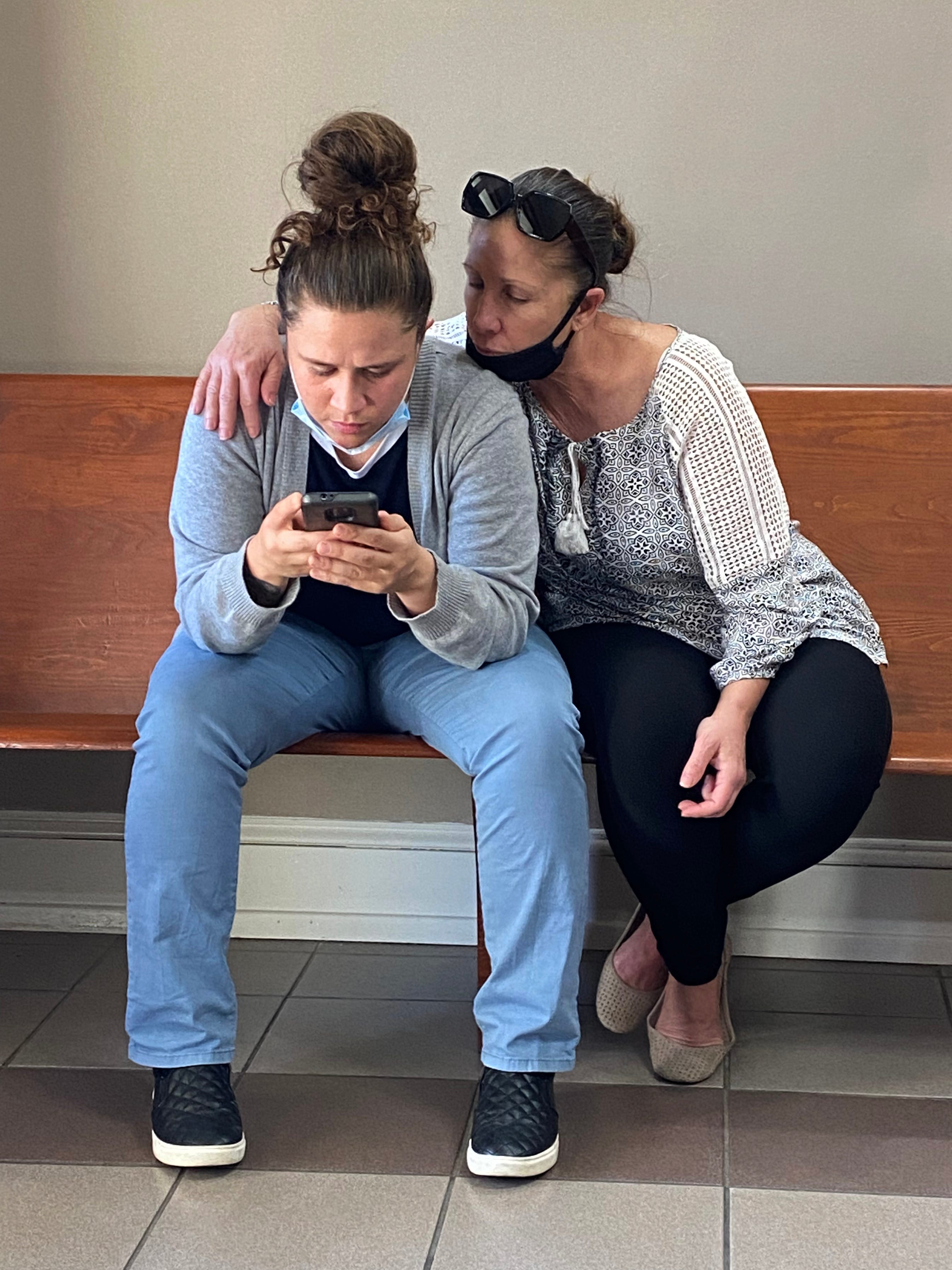 Tiara Helm and her mother, Michelle, await a verdict on the fourth day of the civil trial in October.