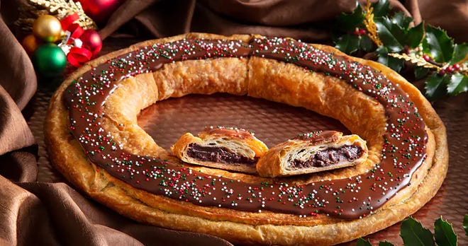 This year's Christmas kringle from O&H Danish Bakery is fudge filled and chocolate frosted. The bakery makes 7,000 kringles a day during December.