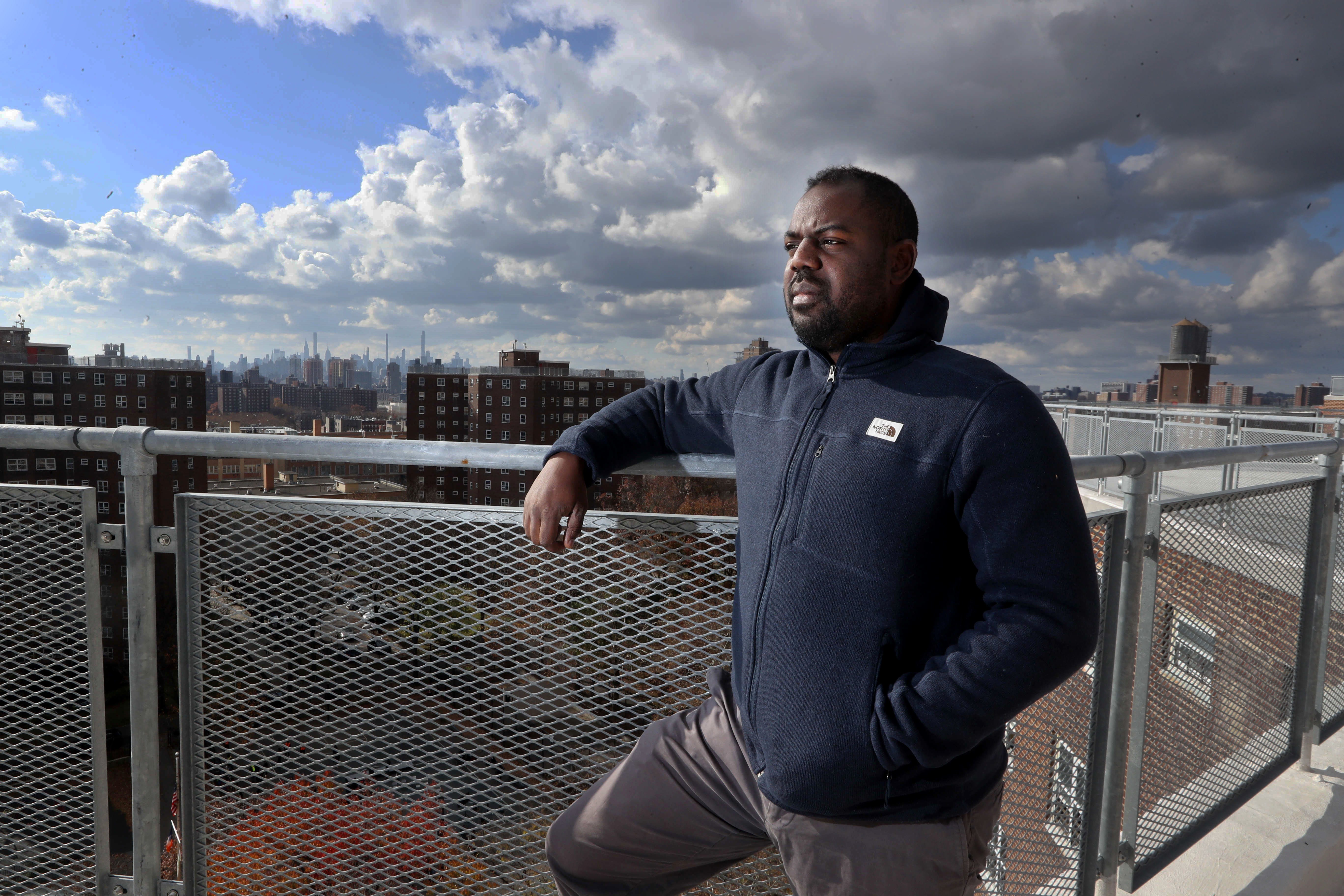 Donnel Baird, CEO of BlocPower, on the rooftop of one of the apartment buildings at the Melrose Houses, a public housing apartment complex in the Bronx, New York Nov. 29, 2021. Baird is one of the co-founders of BlocPower, a company that is installing 'mesh networking' transmitters on the rooftops of multifamily high-rises, churches, and schools throughout the South Bronx in order to bring affordable internet access to populations that are underserved by major internet service providers. Baird plans to bring the same technology to Milwaukee, where he previously lived and worked as a political organizer.