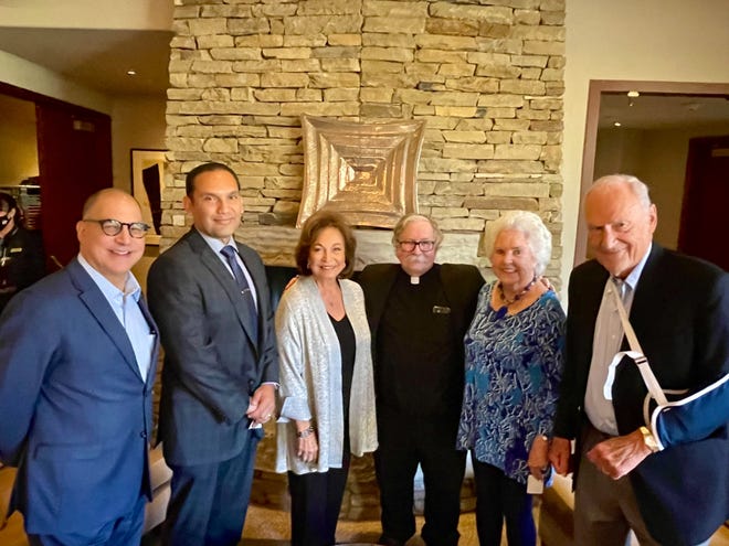 Patrick Evans, RWM board member; Edwin Gomez, Riverside County Superintendent of Schools; Sherrie Auen, Auen Foundation; Father Gregory Elder of Sacred Heart; Roberta Klein, president of RWM, and Clay Klein, secretary of RWM, attend the Read With Me annual major donor meeting and brunch on Nov. 14, 2021.
