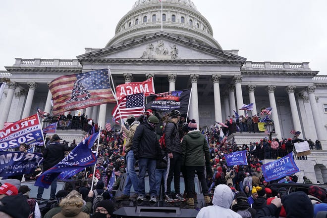 Protesters gather in front of the Capital building on the second day of pro-Trump events in an effort to overturn the results before Congress finalizes them in a joint session of the 117th Congress on Wednesday, Jan. 6, 2021, in Washington, DC. (Kent Nishimura/Los Angeles Times/TNS)