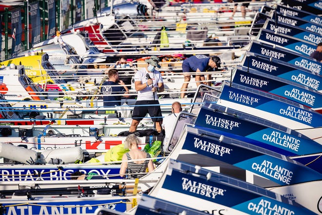 Rowing teams prepare their specialized boats in the Talisker Whiskey Atlantic Challenge boat park in La Gomera in the Canary Islands. The 3,000-mile challenge begins Dec. 12.