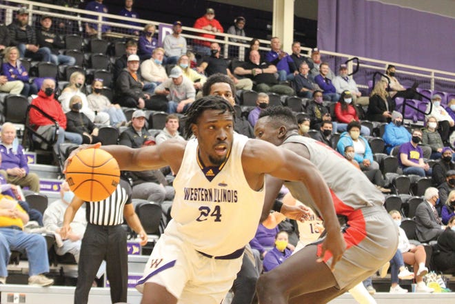 George Dixon goes to the basket for Western Illinois.