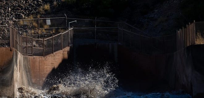 Water rushes through the Caballo Dam into the Rio Grande in New Mexico in May. The dam was opened to release water to southern New Mexico and El Paso.