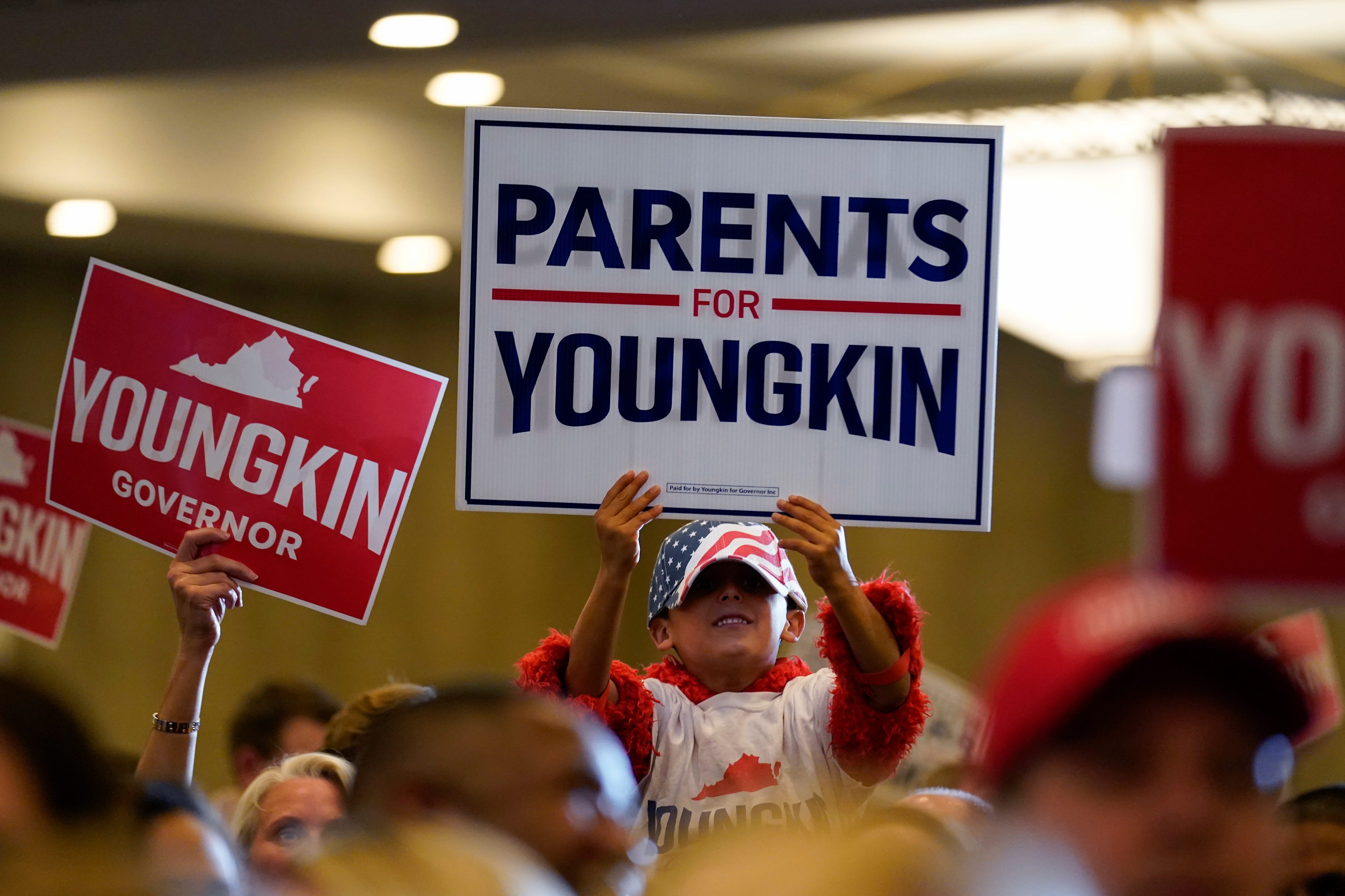 Supporters of eventual Republican gubernatorial winner Glenn Youngkin gather for an election night party in Chantilly, Virginia, on Nov. 2, 2021.