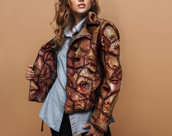 According to Urban Outraged, the "Avery Jacket" is "crafted from the most luxurious skin" and features human mouths and eyes.