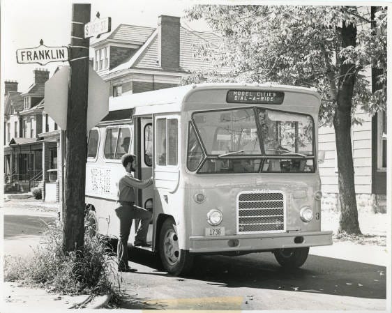 Dial-a-Ride was started in Columbus in October 1971 as part of the Model Cities program. A bus rider would call a central number, and then the bus driver would be radioed the pickup location. The buses were smaller, seating 20-22 passengers, and fares were 20 cents for adults and 10 cents for children and senior citizens. The seven buses averaged 400 passengers daily in the neighborhoods of Mount Vernon, King-Lincoln Bronzeville, Woodland Park, Olde Towne East, Franklin Park and South of Main. The buses also were used as voting booths for those who couldn’t travel to polling locations. The program was considered a success, but funding ended and the last Dial-a-Ride bus ran Dec. 26, 1975.