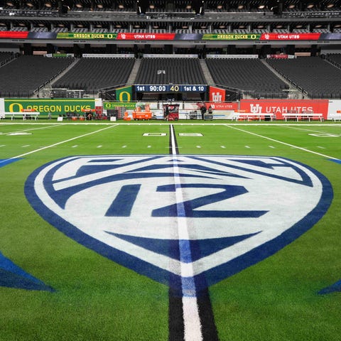 The Pac-12 Conference logo at midfield at Allegian
