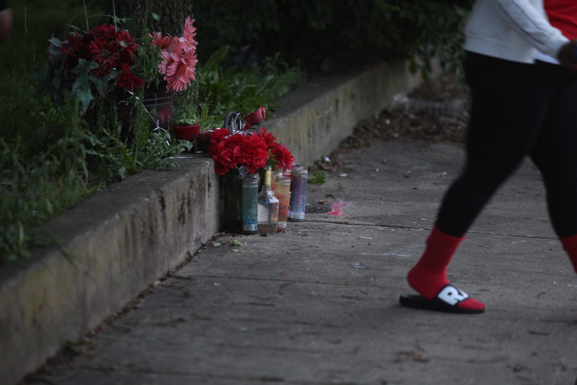 All too familiar,  makeshift memorials like this one honoring 16-year-old Galevon Beauhamp, who died June 21, 2021, usually show up at the site of the crime just hours after the event.