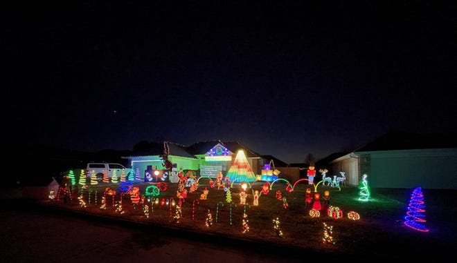 Viewers can tune to 98.1 FM for Robert Dickson’s 25-minute, three-lot display in Bolivar that features homemade singing lightbulbs, leaping arches, a 12.5-foot metal dinosaur, video projection, pixel screen, Nativity scene and lots of Christmas animals and figures in the yard.