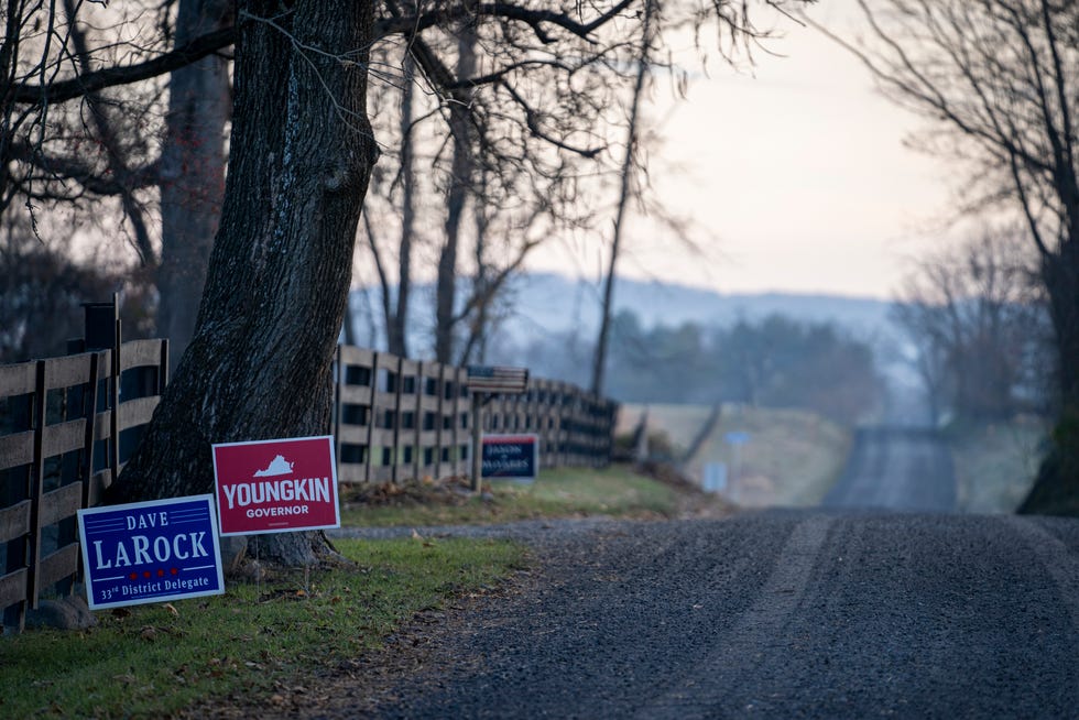 A campaign sign for Virginia governor-elect Glenn Youngkin was still on display on a dirt road in Waterford, Virginia, on Nov. 21. Loudon County, Virginia, exemplifies the rapidly-changing suburbs of the United States, and had an election in 2021 that may shed some light on what suburban and exurban voters may be thinking heading into the 2022 midterms.