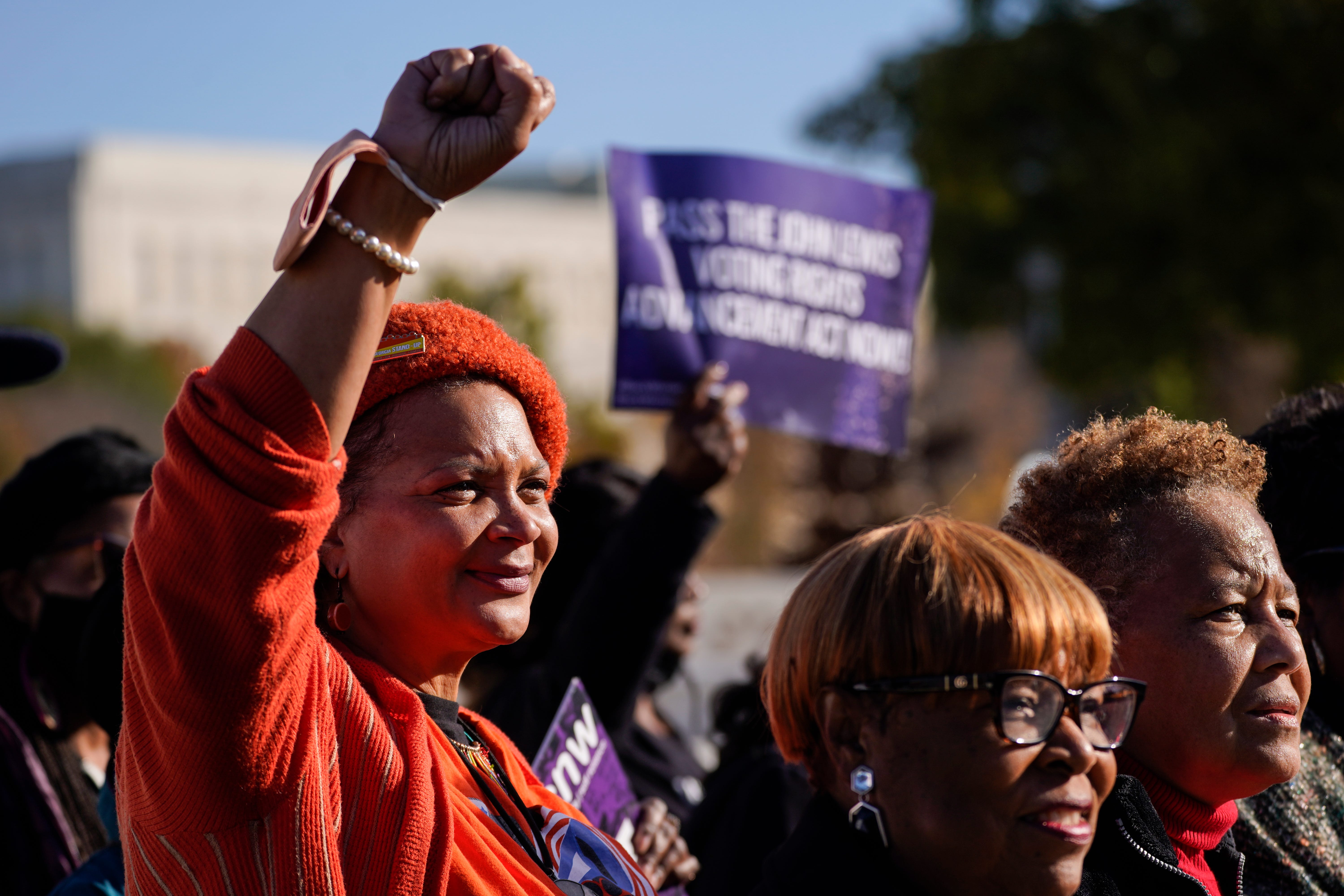 Deborah Scott, executive director of Georgia STAND-UP, joined "The Freedom Walk" Nov. 16, 2021, in support of the John Lewis Voting Rights Advancement Act in Washington, D.C.  Scott's group helped mobilize Black voters in Georgia. “Black women turned out in record numbers and they turned their communities out,'' Scott later told USA TODAY. "That has always been the secret weapon.”