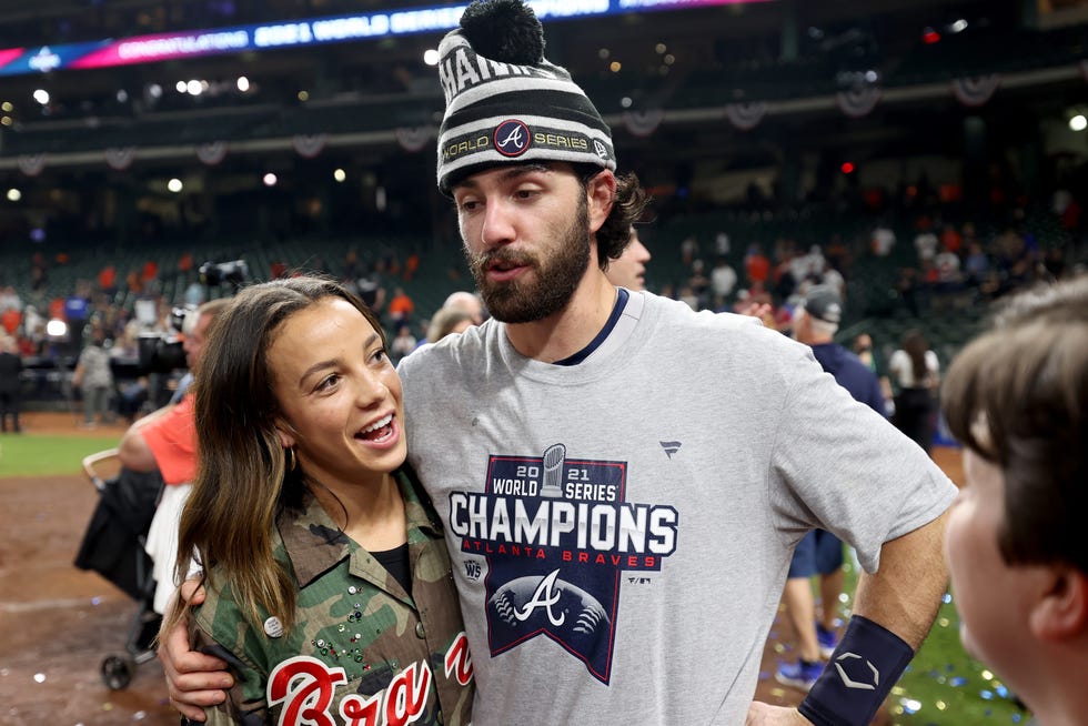 HOUSTON, TEXAS - NOVEMBER 02:  Dansby Swanson #7 of the Atlanta Braves and Mallory Pugh celebrate after the Braves 7-0 victory against the Houston Astros in Game Six to win the 2021 World Series at Minute Maid Park on November 02, 2021 in Houston, Texas. (Photo by Carmen Mandato/Getty Images)