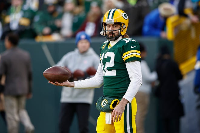 Aaron Rodgers and the Packers have overcome injuries to post an 11-3 record with three games to play.