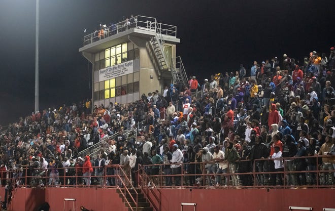 A large crowd watches the Jones vs Pine Forest playoff football game at Pine Forest High School in Pensacola on Friday, Dec. 3, 2021.  The Eagles defeated the Tigers 20-13 in overtime sending them to the state championship game.