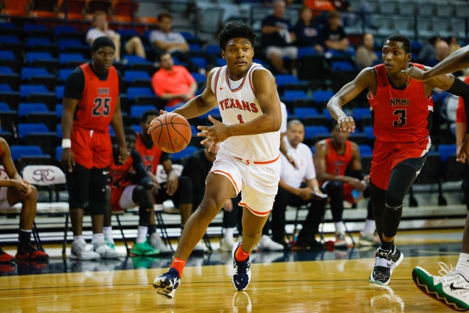 South Plains College guard Jaden Harris (1) posted career highs of 28 points and seven rebounds Monday night, helping the 11th-ranked Texans beat New Mexico Military Institute 93-71 in Roswell, New Mexico. The game was the Western Junior College Athletic Conference opener for South Plains.