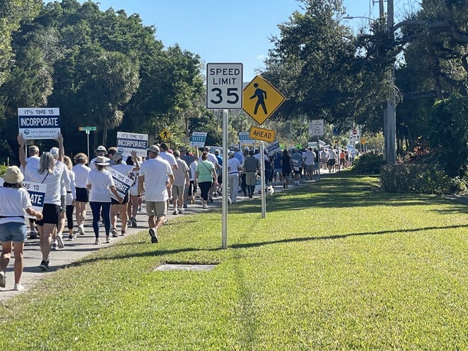 More than 100 people walked on Beach Road on Dec. 5 to demonstrate their support for incorporating Siesta Key.