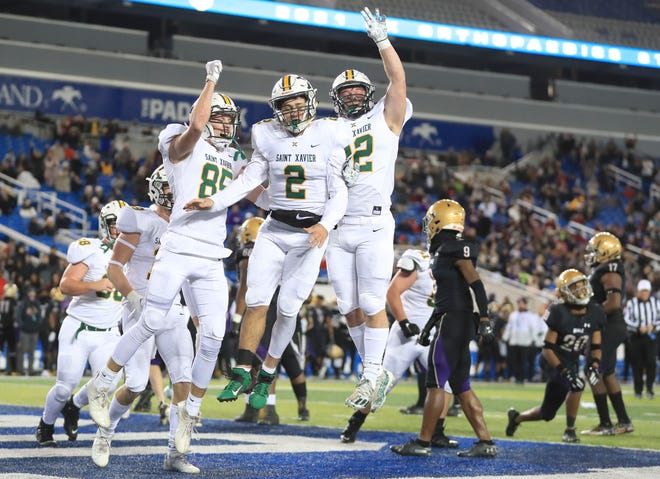 St.X's Jack Sivori, (2), celebrates his touchdown with Will Beckmann, left, and Austin Uhrhan in the first half in the 6A KHSAA football championship Saturday. Dec.3, 2021 