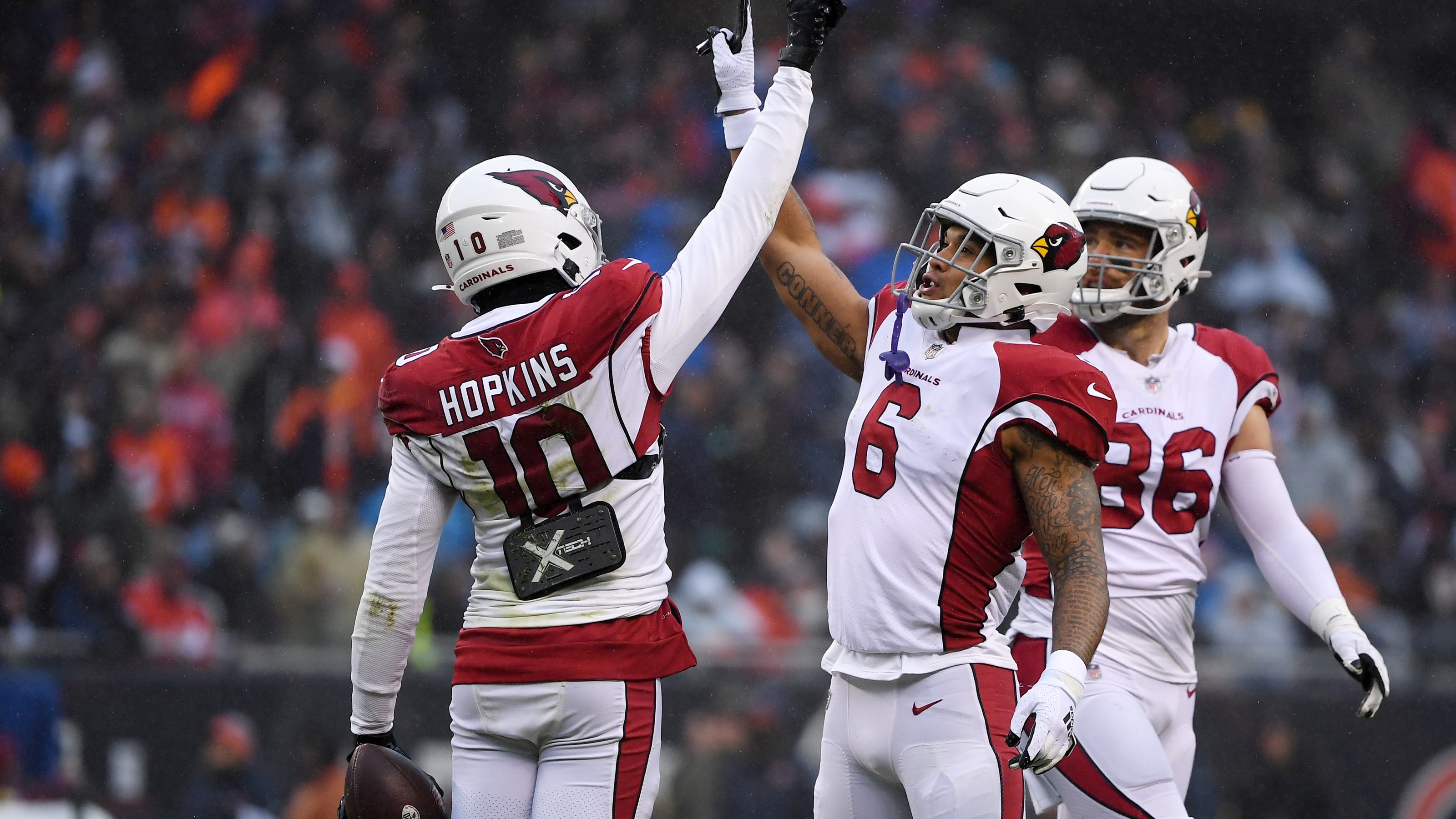 Cardinals receiver DeAndre Hopkins suffered a knee injury in Arizona's...