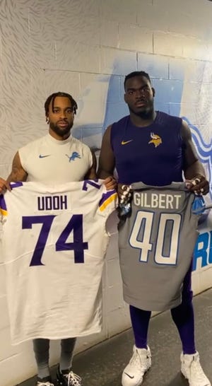 Mark Gilbert, left, and Oli Udoh played two seasons together at Terry Sanford High School. Now, they're in the NFL.