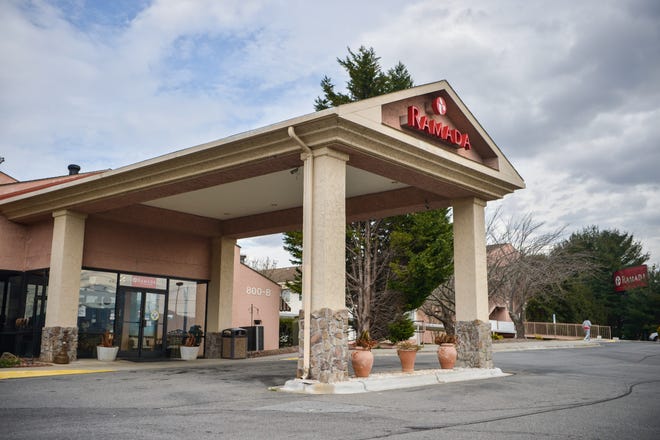 The Ramada Inn in East Asheville is still open to the general public and travelers, though part of it is being used to shelter the unhoused population.