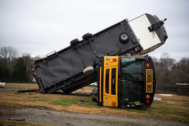Don Robinson was inside a school bus as it flipped over near Hartsville during severe storms this morning. High winds also sent his camper careening into the bus. He escaped unhurt.