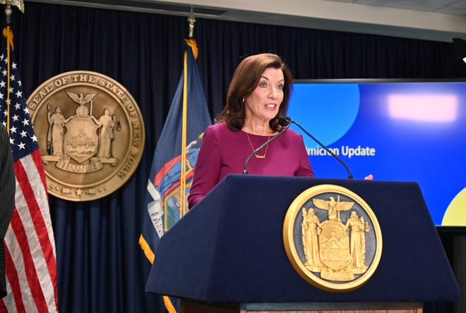 Gov. Kathy Hochul speaks during a past press briefing in Manhattan. Hochul's mask mandate, which went into effect Monday, is being treated as a political football by some.
