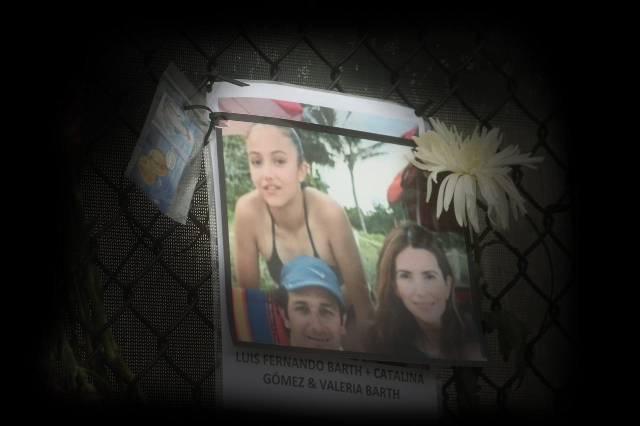 Clockwise from top left: Valeria Barth Gomez, Catalina Gomez, and Luis Fernando Barth. Posters of some of the people missing from the Champlain Towers South condo collapse in Surfside, Florida, were photographed on Monday, June 28, 2021 at the memorial fence near the scene.