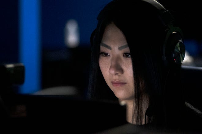 Sara Chang, a gamer from New York, plays Valorant at Metro Esports in Warminster where Metro Esports conducted the final stage of recruiting candidates for its first esports team on Saturday, Dec. 4, 2021.