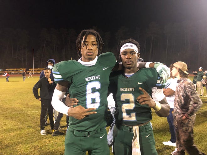 Ponchatoula receiver Amorion Walker (6) and safety Jacoby Mathews (2) pose for a photo after defeating Acadiana 43-26 in the Class 5A semifinals in Ponchatoula on Dec. 3.