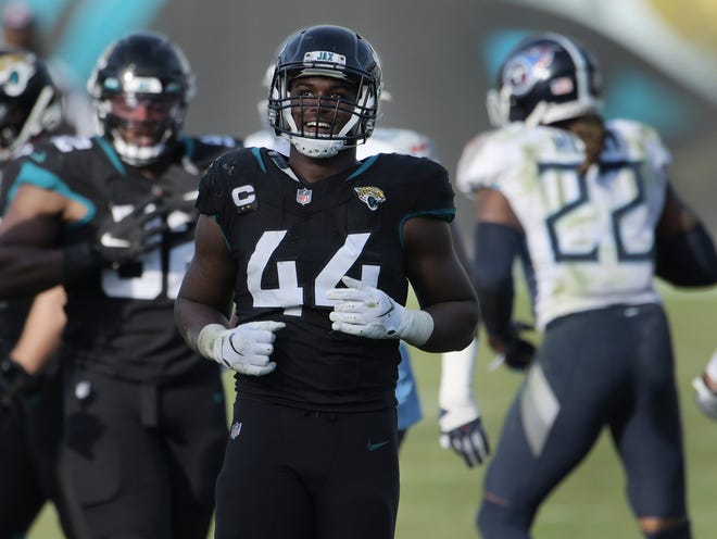 Jacksonville Jaguars outside linebacker Myles Jack (44) watches the replay after a tackle on Tennessee Titans running back Derrick Henry (22) during third quarter action. The Jacksonville Jaguars hosted the Tennessee Titans Sunday, December 13, 2020 at TIAA Bank Field in Jacksonville, Florida. The Jaguars trailed at the half 17 to 3.  [Bob Self/Florida Times-Union]