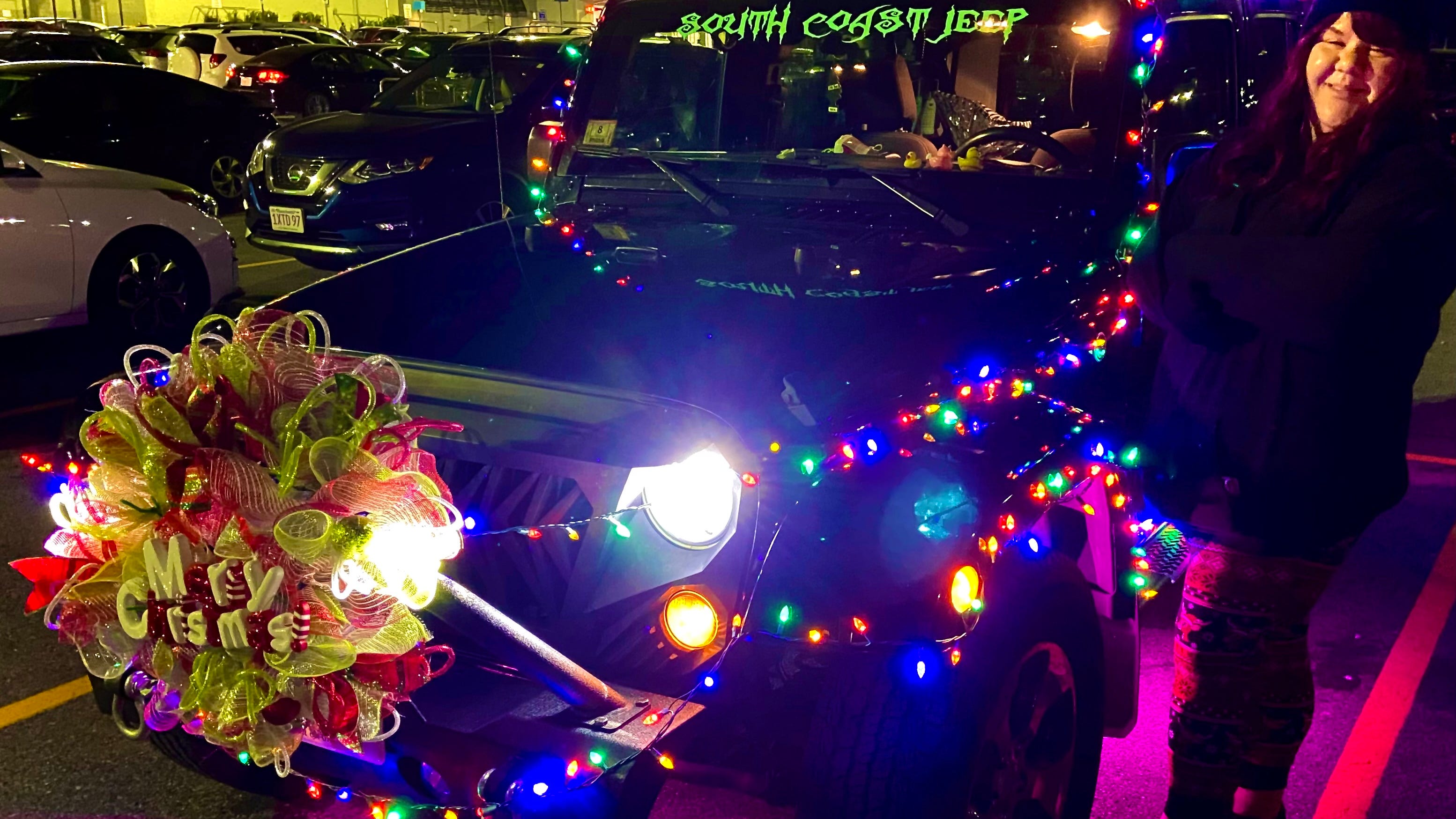 Fall River Jeep Wrangler decorated with wreaths, 500 Christmas lights