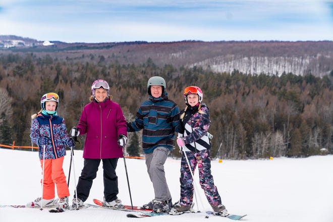 Skiers enjoy the view at Treetops in Gaylord. The resort hopes to have its ski areas open by this weekend. Otsego Resort is planning on a Dec. 18 start.