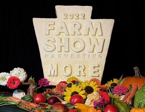 This 20-pound mini butter sculpture of the 2022 Harvesting More Farm Show logo was sculpted by Garret McCall, winner of the 2021 Butter Up! competition held during the virtual 2021 PA Farm Show.