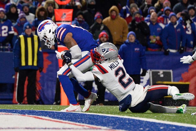Bills wide receiver Gabriel Davis (13) recovers a pass from Josh Allen for a touchdown.