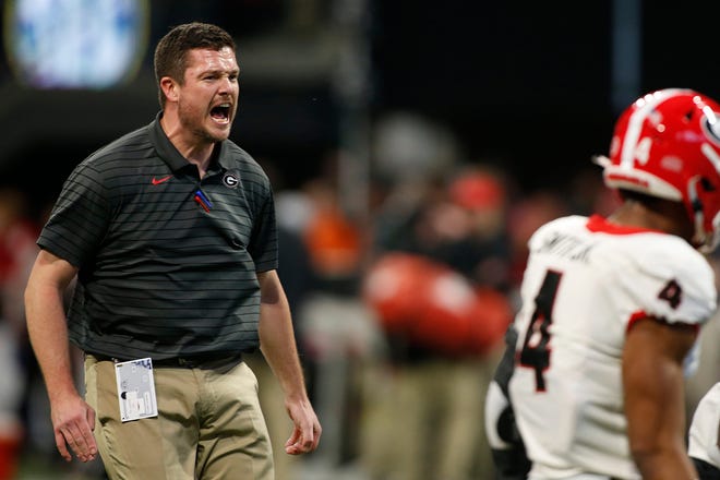 Georgia defensive coordinator Dan Lanning will be named the new football coach at Oregon, according to a report.