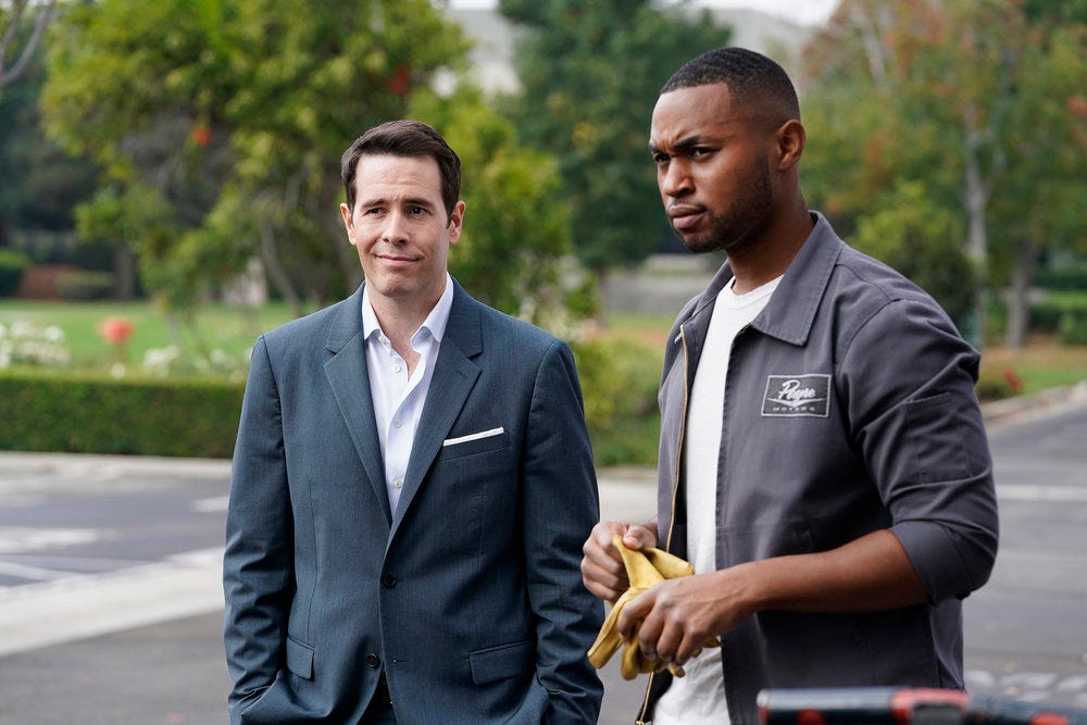 Jon Barinholtz (left) and Tye White are among the players in 'American Auto,' NBC's new sitcom focused on the car industry. Barinholtz plays a clueless company scion passed over for the CEO spot, while White is an assembly line worker suddenly promoted to the executive suite.