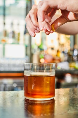Zilker Park Punch from Hotel Magdalena's Summer House on Music Lane is an Austin-inspired bourbon punch with floral and citrus hints.