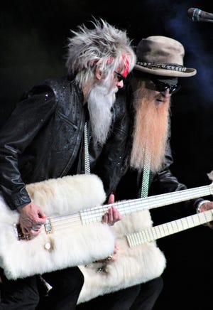 ZZ Top bassist Elwood Francis, left, and guitar player Billy Gibbons broke out the fuzzy guitars for "Legs" during a December 2021 show in Abilene, Texas.